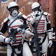 How would you describe these guys? It’s like Stormtroopers meet Tron, or if GI Joe’s Cobra worked out of an Apple store.